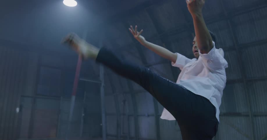 A man dances in the building