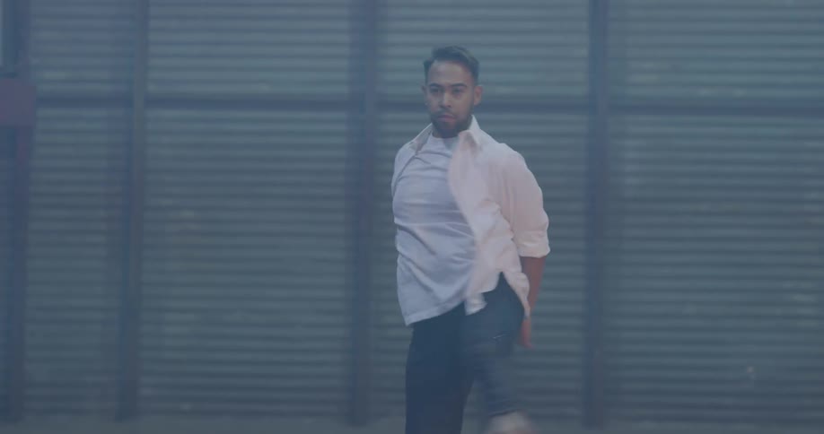 A man dances alone