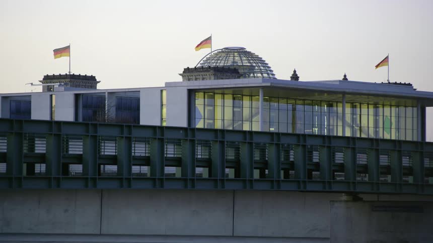 A building with flags on it is displayed