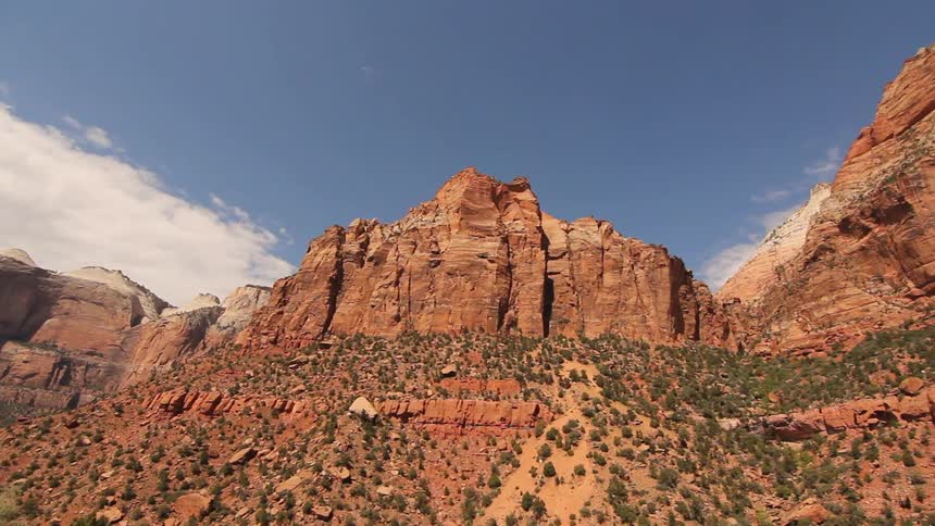 View looking up the side of a desert plateau