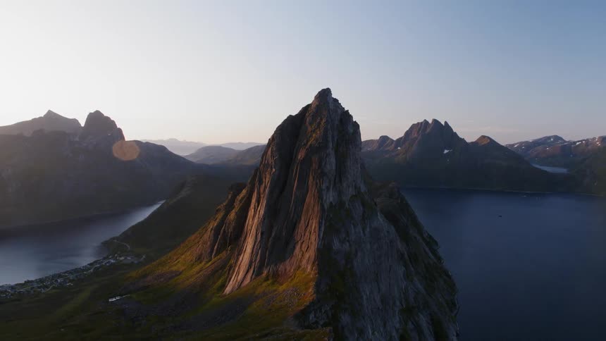 Fjord water surrounding mountains