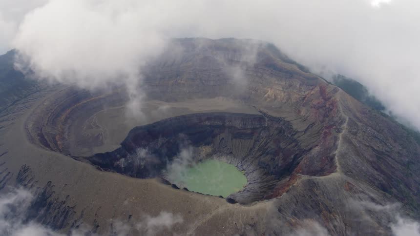 A volcano surrounded by clouds
