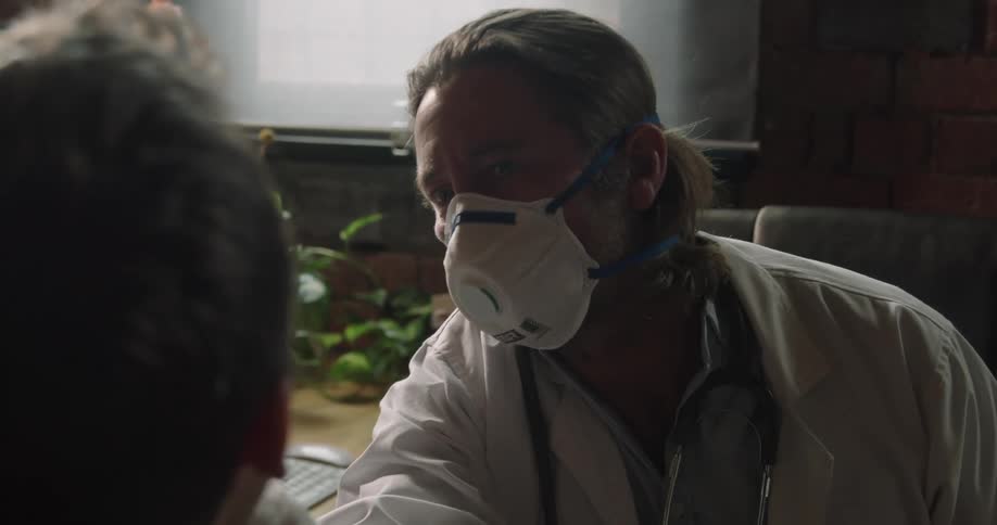 A doctor is examining a patient