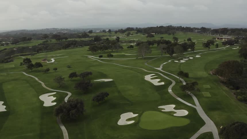 An empty golf course on a cloudy day