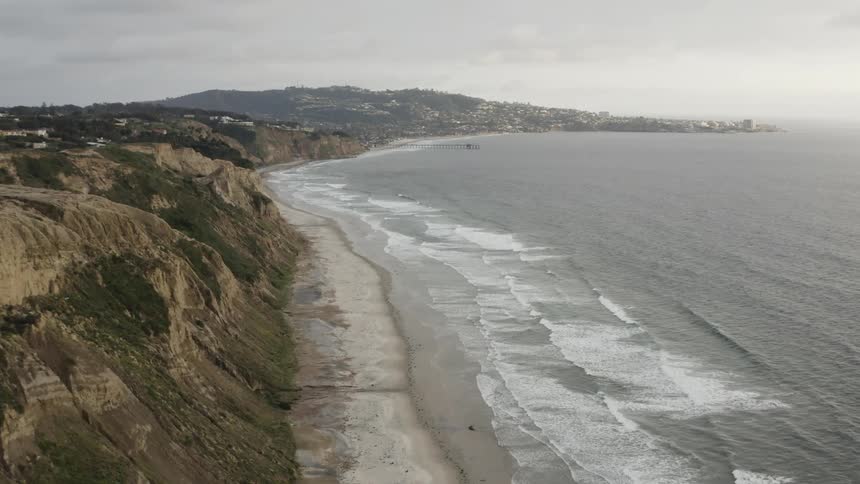 The tide washes up on a beach