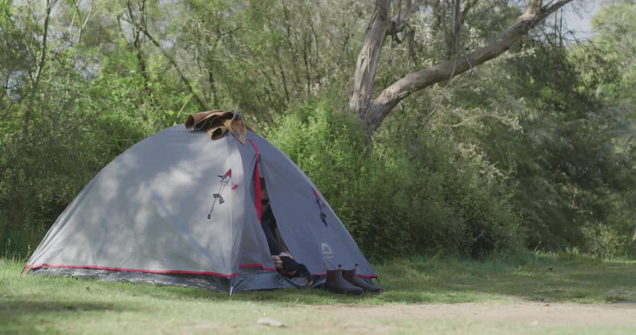 A man setting up a tent
