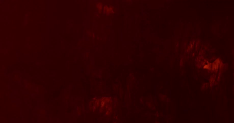 The red liquid mixes around