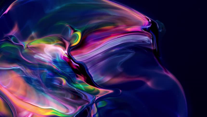 Bright colors and light swirl and expand against a dark background