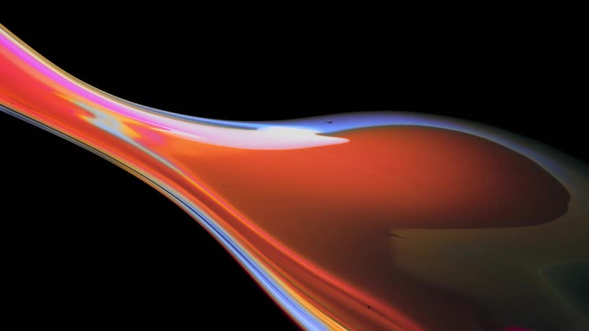 A beautiful red fluid shape flows on black background