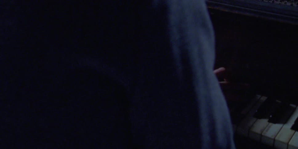 A man plays the piano