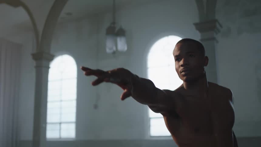 A man exercises inside