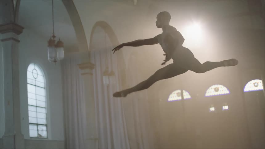 A person dances through the air