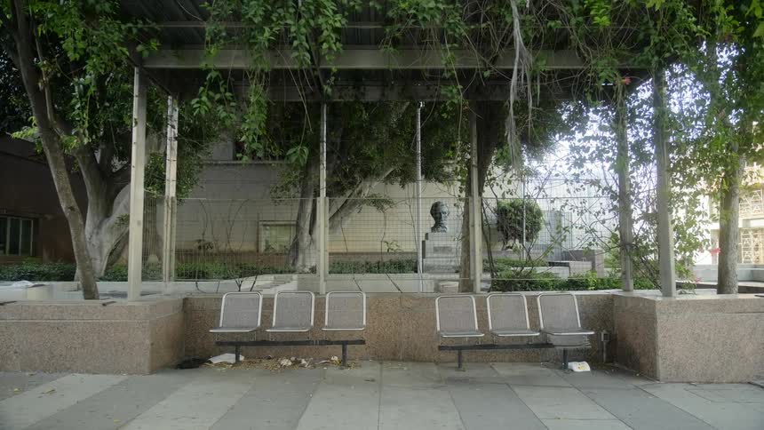 Empty park benches in a city