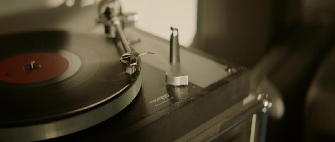 A record player spins a record