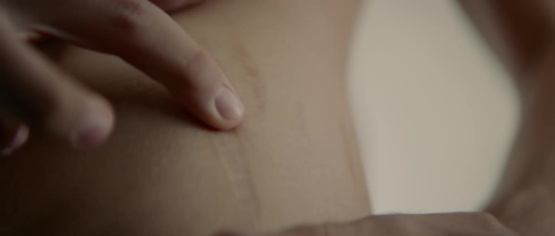 Person stretches along stretches lines at their stomach