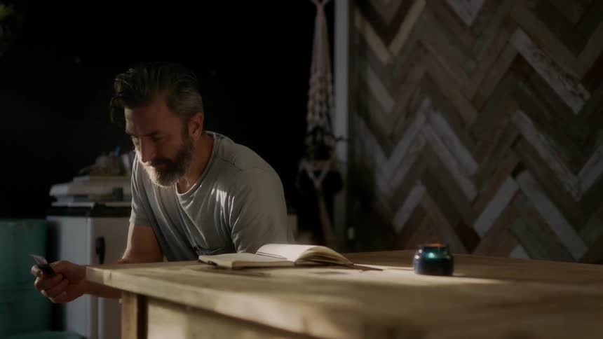 A man sits at the table