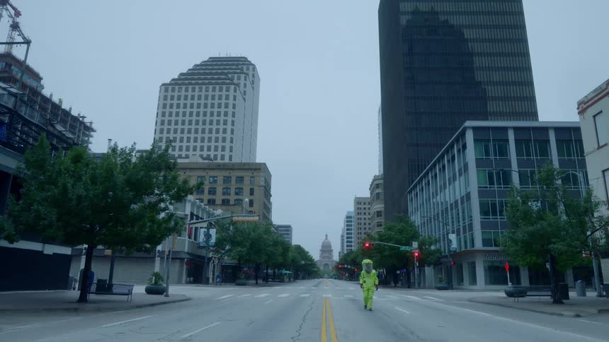 A man walks down the road
