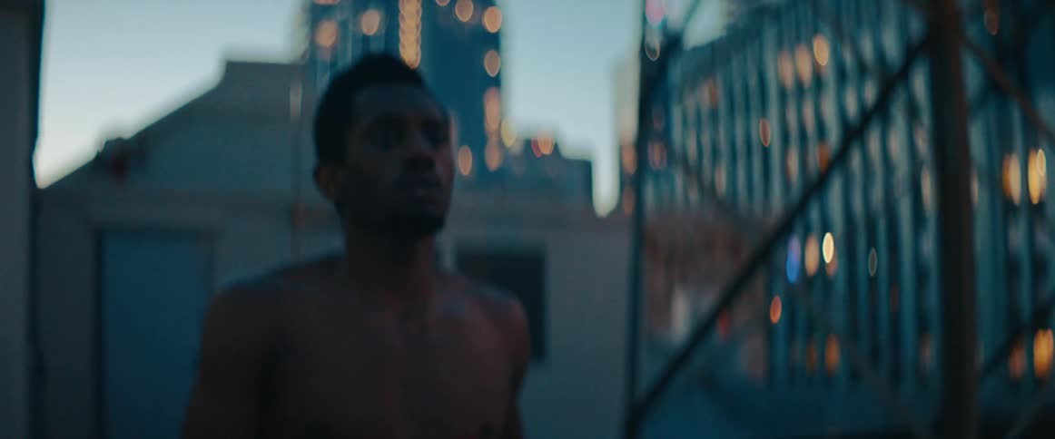 A man runs outside by the building
