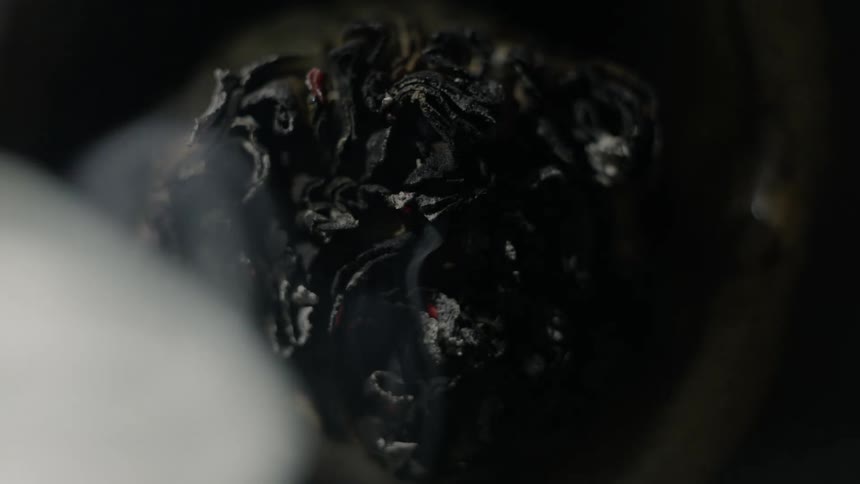 A soft grey and black powder that is left after a substance has burned