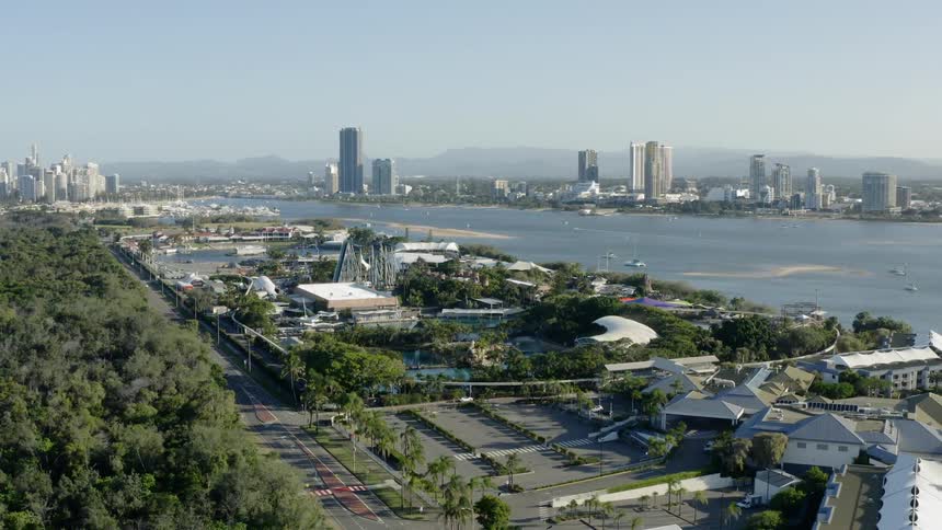 Apartment buildings sit along the lakefront with downtown visible across the water