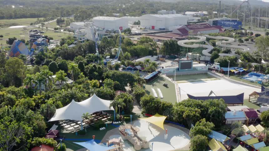 Golf cart driving through deserted water park during the off season