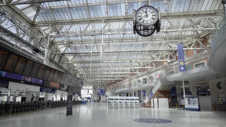 A few people occupy transportation center leaving departures almost empty