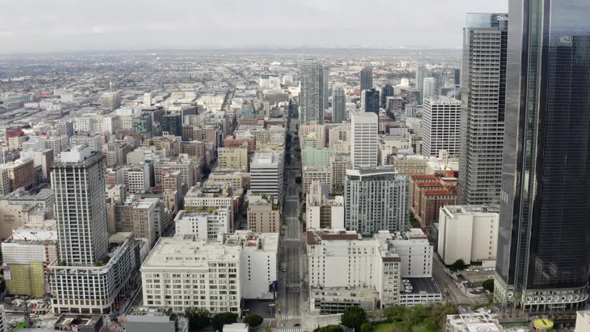 Aerial view of very tall buildings and the skyscrapers with many houses stores businesses