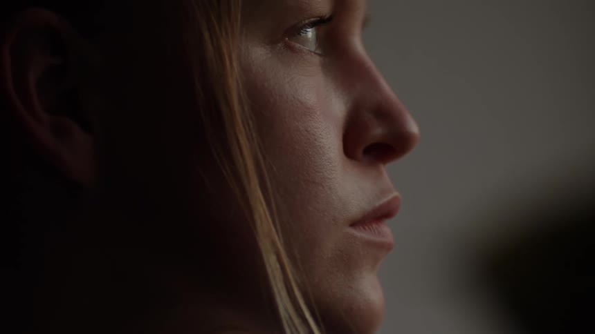 A woman looks around