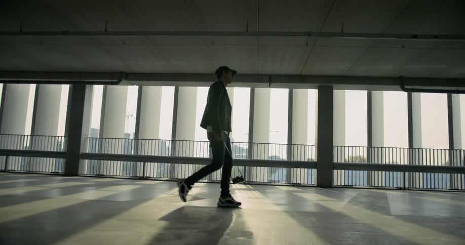 Man walks along the corridor of the building