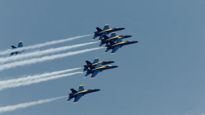 Many jets fly through the sky