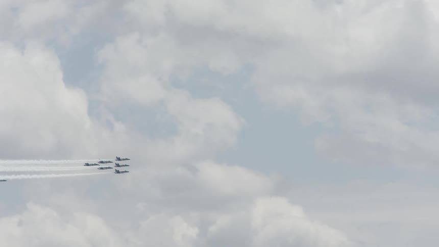 Seven jets fly in formation