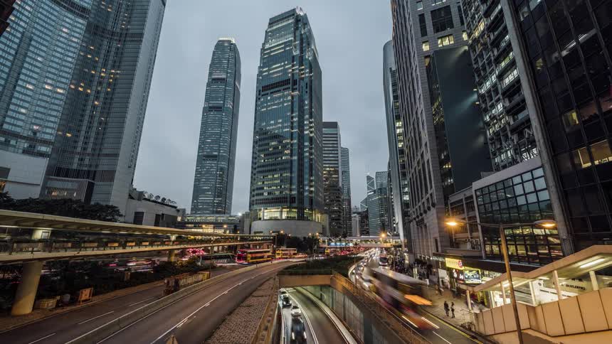 City streets with buildings vehicles and people