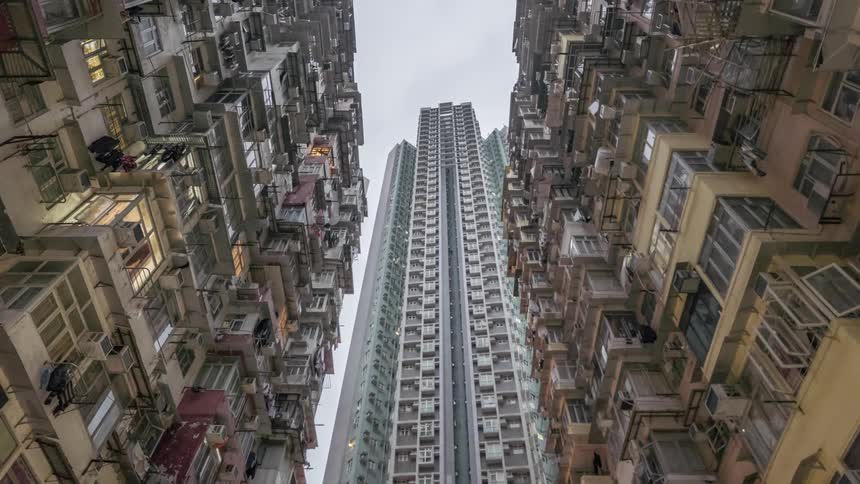 Three skyscrapers in a metropolis during the day