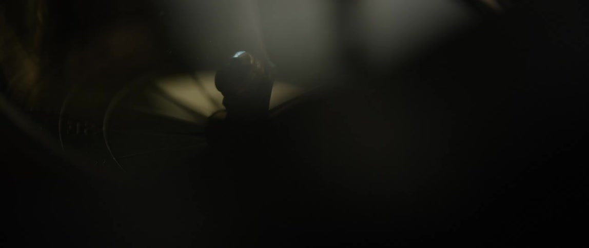 A compass creates shadows under dim light