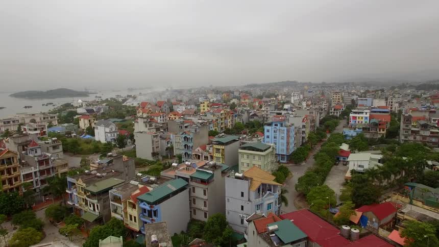 Aerial view of a city on the water