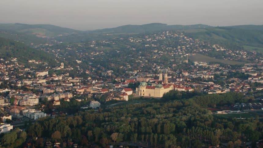 The buildings line the sides of the hills
