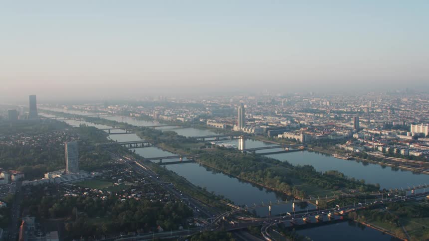 The vehicles travel over the bridges through the city