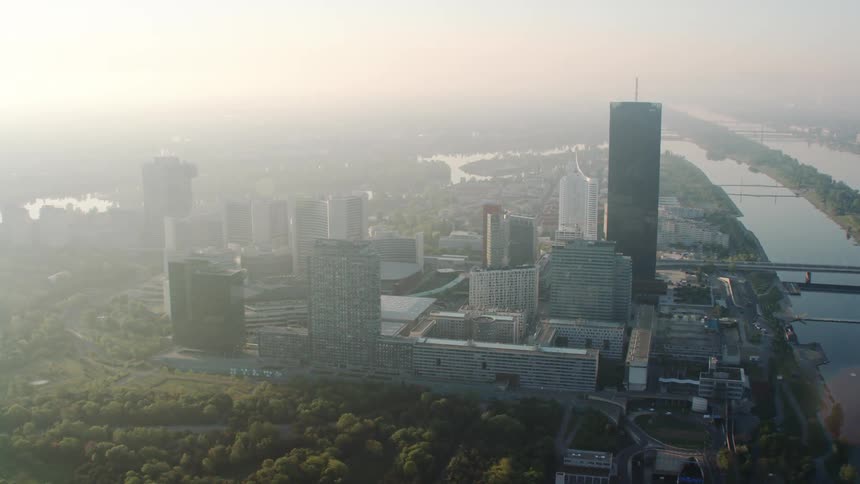 Skyscrapers and a river running through a downtown area