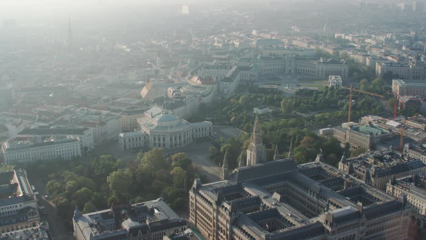 An aerial view of a downtown area is displayed