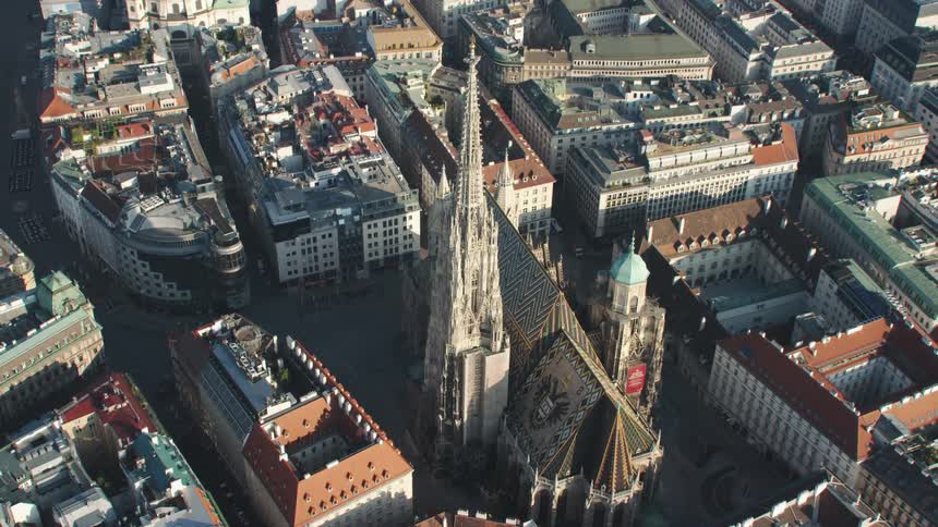 A large cathedral in a european city during the day