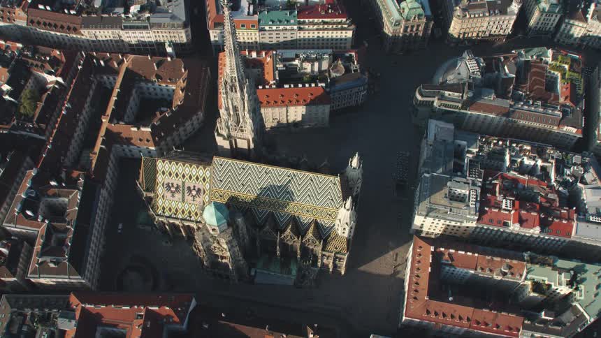 A church surrounded by buildings