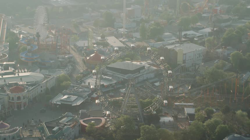 Aerial view of a ferris wheel in an amusement park