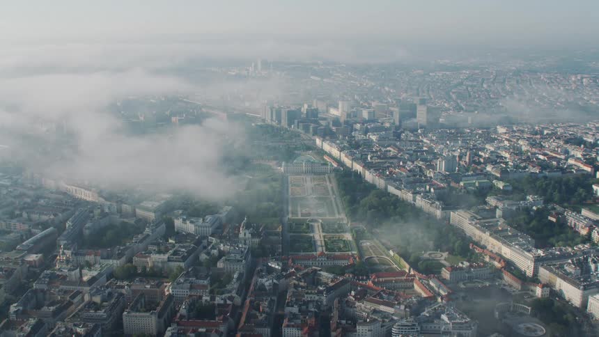 Horizontal aerial view over the rooftops of the buildings in vienna