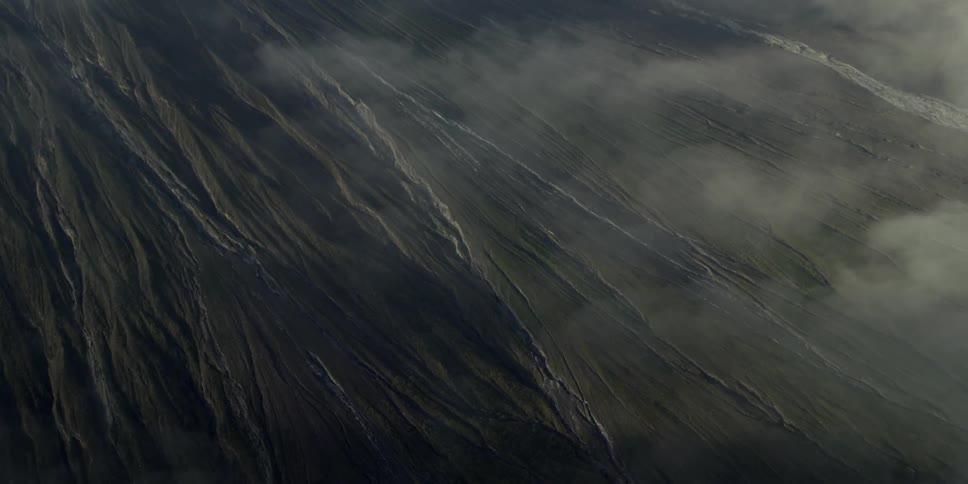 Mist floating over a rocky landscape