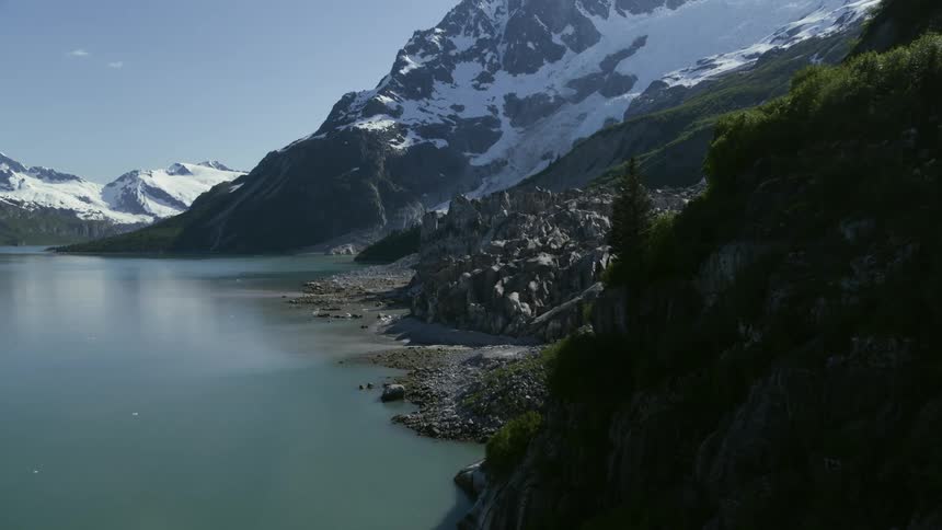 A lake at the base of a mountain