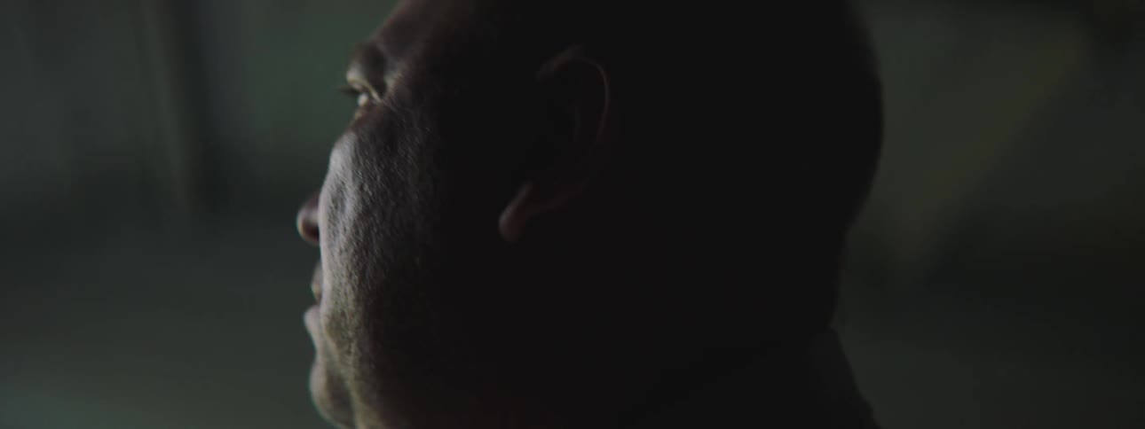 Close up of sad bald man indoors