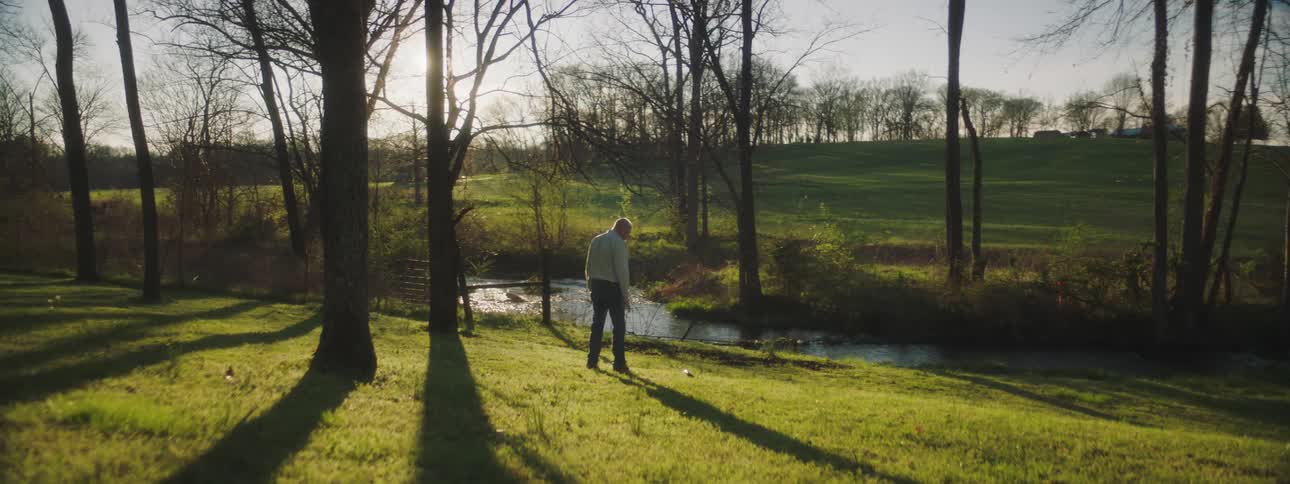 A man throws a gun on the ground