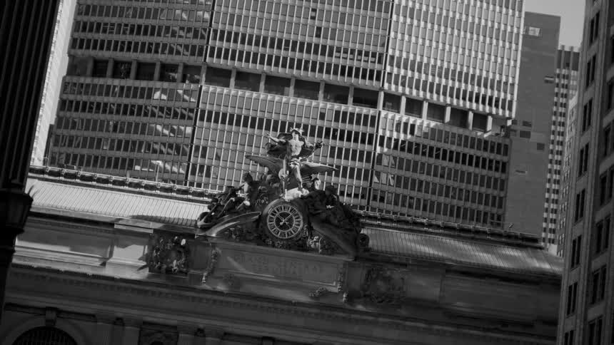 The clock holds a statue