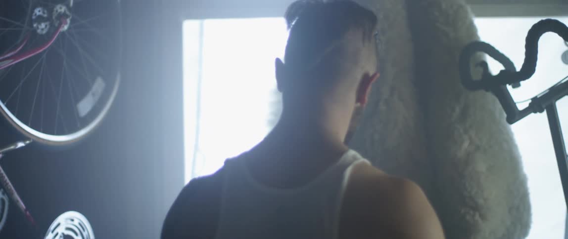 Male fighter warms up in the garage
