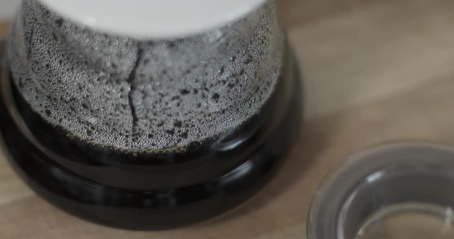 Small bubbles form in a ceramic dish